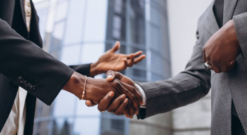 african-business-male-people-shaking-hands (1)