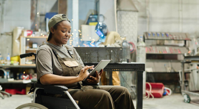 female-worker-with-disability-using-tablet-pc (1)