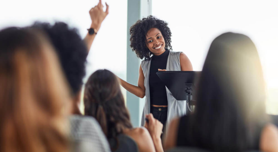 i-hope-that-answers-your-question-cropped-shot-attractive-young-businesswoman-speaking-business-conference (1)