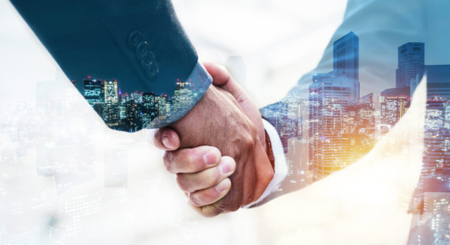 welcome-double-exposure-business-man-partner-handshake (1)